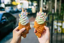 Fish-shaped taiyaki waffle cones filled with soft serve.